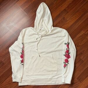 EUC hoodie with embroidered floral design down both sleeves, kangaroo pocket